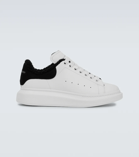 Oversized leather and shearling sneakers