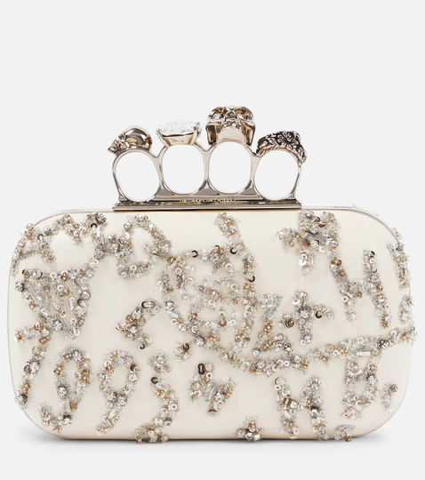 Four Ring embellished leather clutch